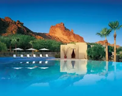 Image may contain Building Hotel Resort Water Pool Housing Villa House and Swimming Pool